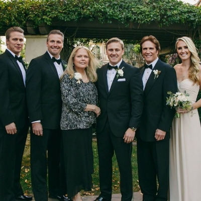 Taryn with her father, mother, and her three brothers.